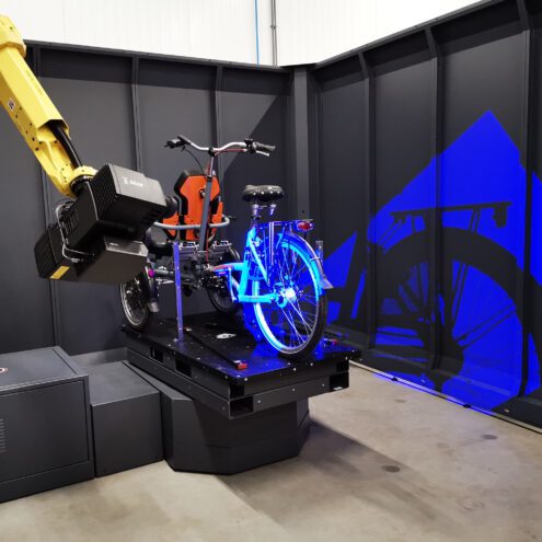 een vanraam fiets die door robotisering word gescanned op fouten ebike gelderland
