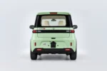 Mintgroene Scheelen Skyliner TS recht van achteren, met grote achterruit en een brede achterlichtstrook.